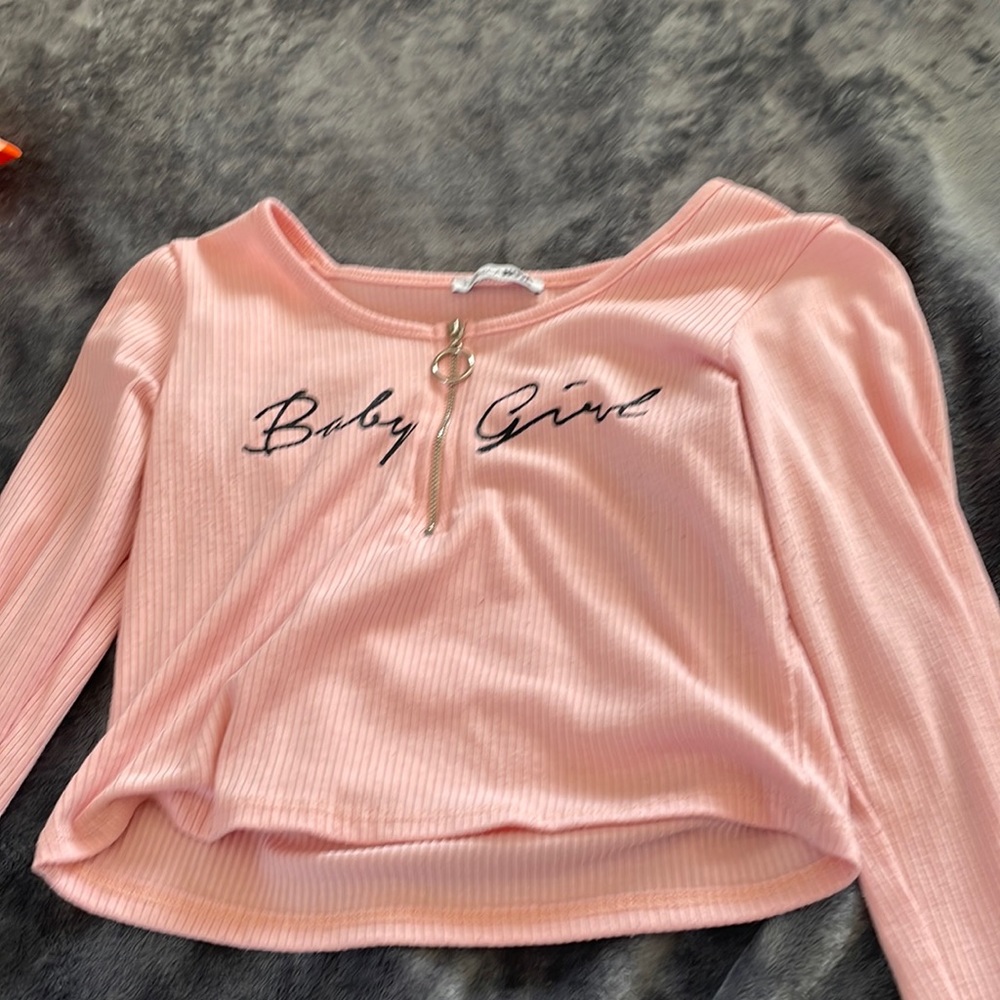 Shirt says baby girl